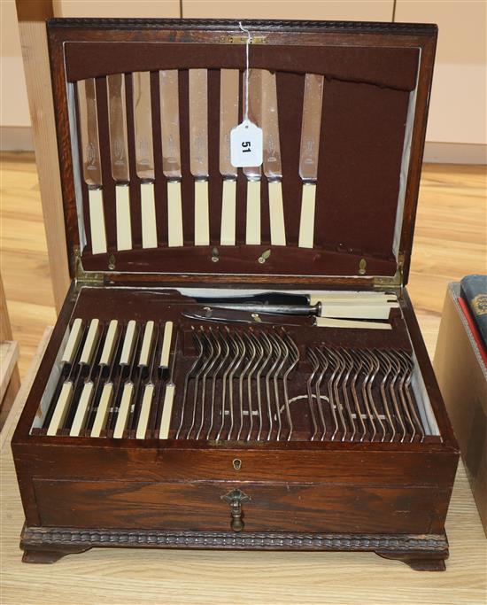 An oak cased canteen of plated flatware